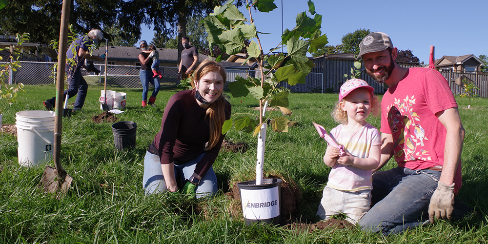 ""Enbridge employees planting trees